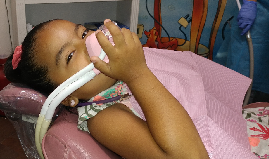 Picture of patient wearing laughing gas mask